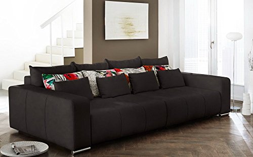 Big Sofa in schwarz mit geteilter Sitz-/Liegefläche, Schlaffunktion, 4 große, 4 mittlere und 4 kleine Kissen, Rücken, B/H/T ca. 294/90/146 cm